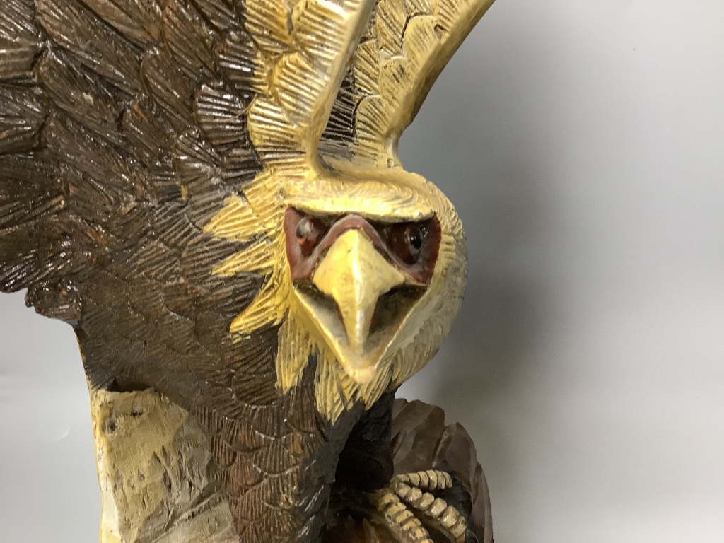 A carved wood eagle, height 61cm